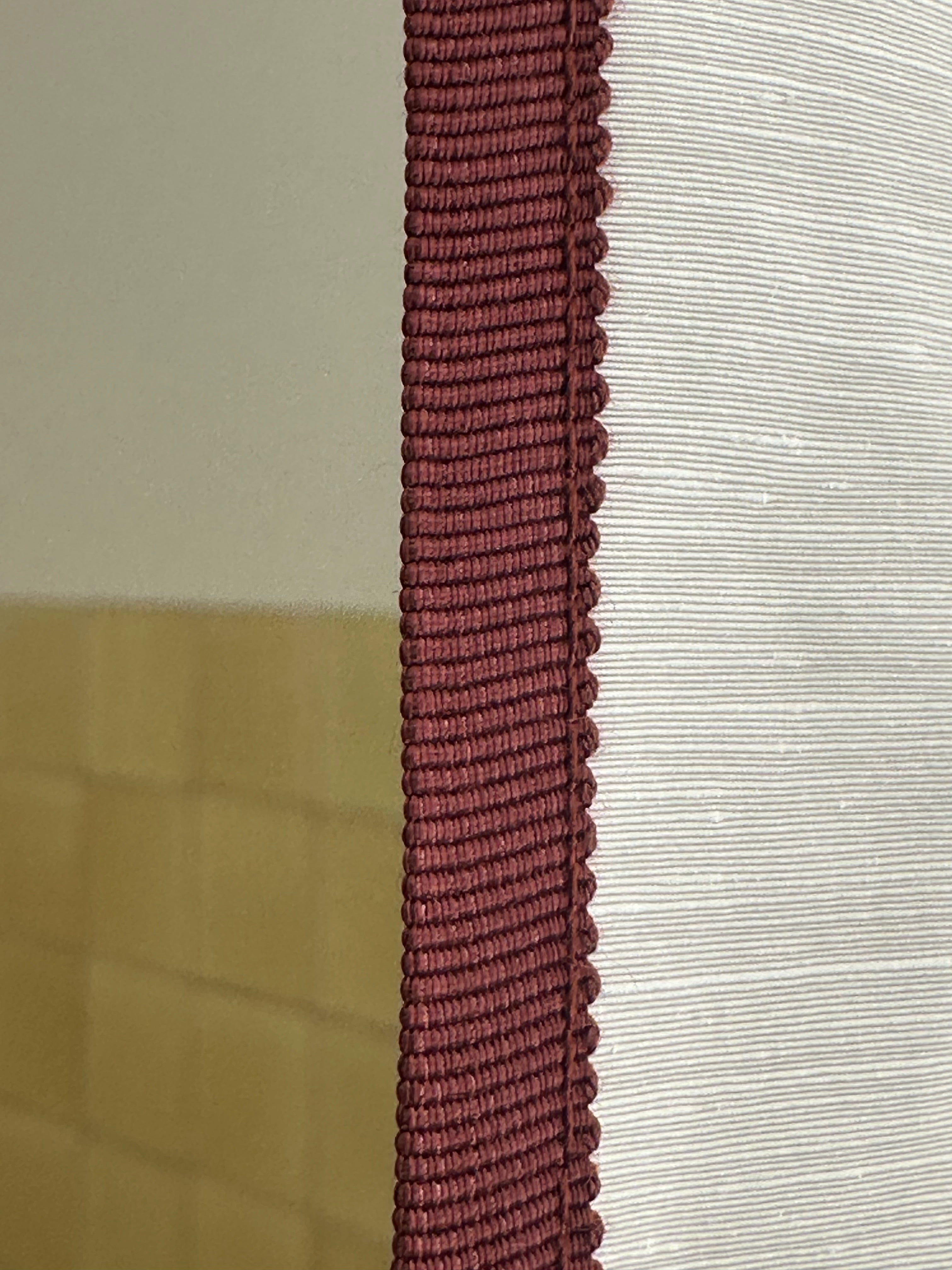 Detail view of Winther Wackerhausen Clean shower curtain featuring a Deep Reddish Brown trim on soft ivory fabric.