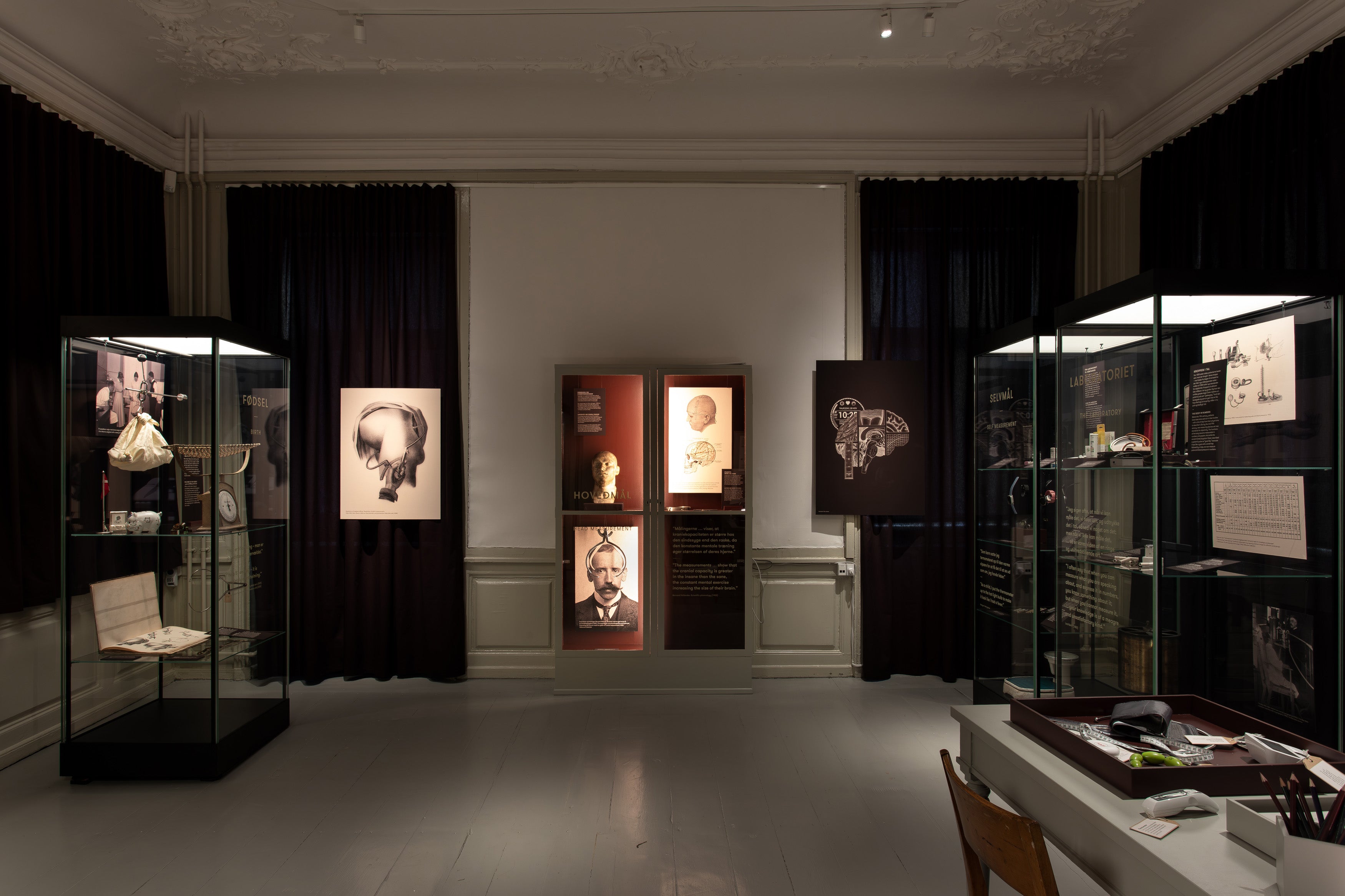 Winther Wackerhausen–designed blackout curtains for the Medicinsk Museion exhibition, creating a refined backdrop for historical medical displays